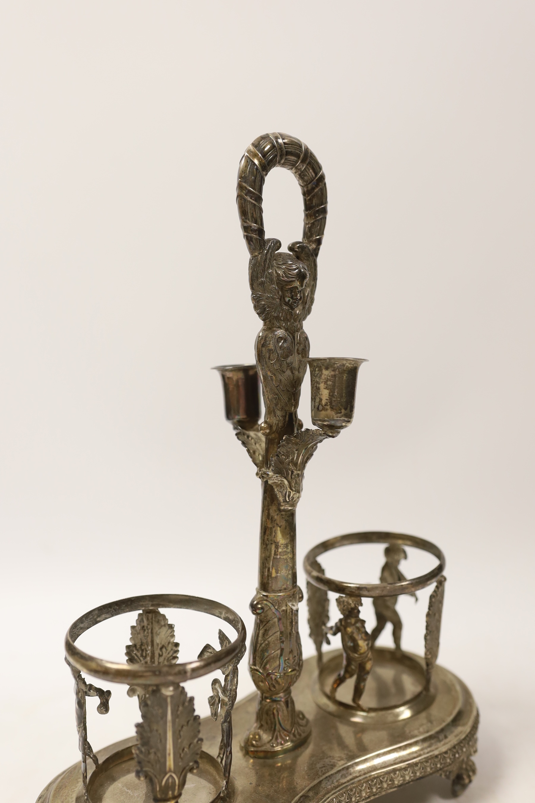 A 19th century Italian? white metal Empire style oil and vinegar stand, eight 31.5cm, 11.8oz. Condition - fair